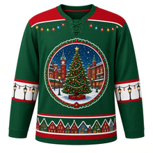Load image into Gallery viewer, Ugly Christmas Christmas Village Lights Hockey Jersey in Garland Green, front view – garland green body with red yoke with a round snowy town square crest with a decorated tree, clock tower and glowing shops, string-light yoke, street-lamp sleeve art and a snowy rooftop hem band – custom name and number