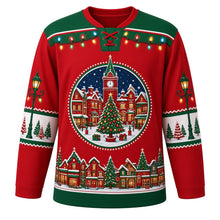 Load image into Gallery viewer, Ugly Christmas Christmas Village Lights Hockey Jersey in Lantern Red, front view – lantern red body with green yoke with a round snowy town square crest with a decorated tree, clock tower and glowing shops, string-light yoke, street-lamp sleeve art and a snowy rooftop hem band – custom name and number