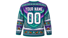 Load image into Gallery viewer, Ugly Christmas Winter Wonderland Hockey Jersey in Aurora Teal, back view with arched YOUR NAME lettering, a big 00, a northern-lights sky, a pine forest and fox and snowflake hem band – custom name and number