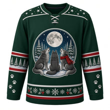 Load image into Gallery viewer, Ugly Christmas Moonlit Wolf Pack Hockey Jersey in Pine Green, front view – pine green body with a star-and-crescent-moon yoke with a round crest of three wolves, one in a red scarf, howling at a full moon above snowy pines, plus pine tree and paw print sleeves and a holly-and-snowflake hem band – custom name and number