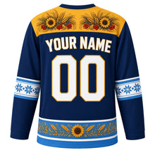Load image into Gallery viewer, Ukraine Original Hockey Jersey in Dnipro Navy, back view with your name and number – Petrykivka-painted yoke and vyshyvanka embroidery sleeve bands