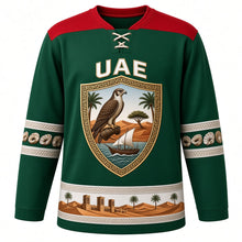 Load image into Gallery viewer, United Arab Emirates Original Hockey Jersey in Oasis Green, front view – ornate Al Sadu shield crest with falcon, dhow and ghaf tree, detailed artwork, custom name and number