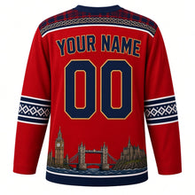 Load image into Gallery viewer, United Kingdom Original Hockey Jersey in Pillar Box Red, back view with your name and number – tartan and Celtic knot yoke with Fair Isle sleeve bands