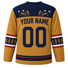 Load image into Gallery viewer, USA Patriotic Amber Waves Prairie Hockey Jersey in Harvest Gold, back view with your name and number – golden wheat stalks and small white stars on navy yoke with matching sleeve and hem bands