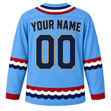 Load image into Gallery viewer, USA Patriotic Bunting Banner Heritage Hockey Jersey in Parade Sky, back view with your name and number – a scalloped row of red, white and blue pleated bunting yoke with matching sleeve and hem bands
