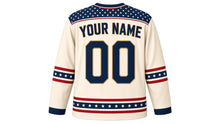 Load image into Gallery viewer, USA Patriotic Classic Stars and Stripes Heritage Hockey Jersey in Independence Cream, back view with your name and number – star-field yoke with heritage triple sleeve stripes and flag-stripe hem band