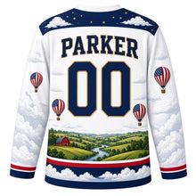 Load image into Gallery viewer, USA Patriotic Liberty Balloon Skies Hockey Jersey in Cumulus White, back view with your name and number – a band of puffy white clouds and tiny gold stars yoke with matching sleeve and hem bands
