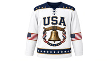 Load image into Gallery viewer, USA Patriotic Liberty Bell Crest Hockey Jersey in Independence White, front view – antique cracked bell on a wooden beam with stars and tricolor ribbon crest, starry yoke, custom name and number, custom name and number