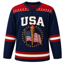 Load image into Gallery viewer, USA Patriotic Liberty Torch Flame Hockey Jersey in Torch Navy, front view – gold liberty torch wrapped in a flowing American flag ribbon, custom name and number