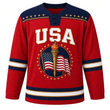 Load image into Gallery viewer, USA Patriotic Liberty Torch Flame Hockey Jersey in Flame Red, front view – gold liberty torch wrapped in a flowing American flag ribbon, custom name and number