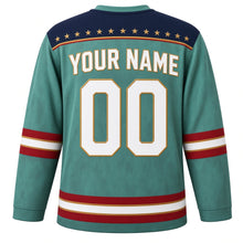 Load image into Gallery viewer, USA Patriotic Liberty Torch Flame Hockey Jersey in Patina Teal, back view with your name and number – rows of tiny gold stars on navy with a thin flame-orange pinstripe yoke with matching sleeve and hem bands