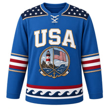 Load image into Gallery viewer, USA Patriotic Lighthouse Harbor Flag Hockey Jersey in Sea Blue, front view – striped lighthouse flying the American flag inside a rope border, custom name and number