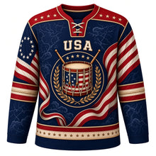Load image into Gallery viewer, USA Patriotic Revolutionary Drum Corps Hockey Jersey in Minuteman Navy, front view – antique colonial snare drum with crossed drumsticks and 13-star flag ribbons, custom name and number
