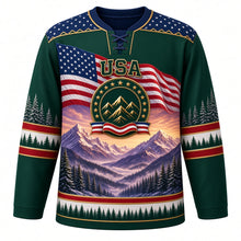 Load image into Gallery viewer, USA Patriotic Rocky Mountain Majesty Hockey Jersey in Pine Ridge Green, front view – snow-capped purple mountains at dawn under a waving American flag sky, custom name and number