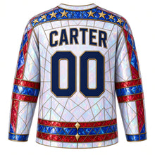 Load image into Gallery viewer, USA Patriotic Stained Glass Stars Hockey Jersey in Opal White, back view with your name and number – a decorative yoke of small sapphire and gold glass star panes with lead lines yoke, matching sleeve and hem bands
