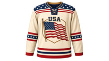 Load image into Gallery viewer, USA Patriotic Vintage Waving Flag Hockey Jersey in Parchment Cream, front view – large rippling American flag crest on a wooden pole, flowing flag-stripe yoke, custom name and number, custom name and number