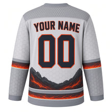 Load image into Gallery viewer, Volcanic Eruption Original Hockey Jersey in Ash Cloud, back view with your name and number – hexagonal basalt yoke and cracked lava hem stripes