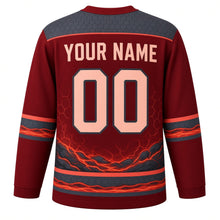 Load image into Gallery viewer, Volcanic Eruption Original Hockey Jersey in Crimson Obsidian, back view with your name and number – hexagonal basalt yoke and cracked lava hem stripes