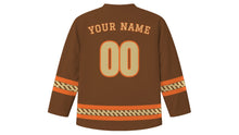 Load image into Gallery viewer, World Wildlife Day Original Hockey Jersey in Earth Brown, back view with your name and number