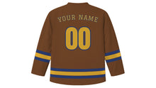 Load image into Gallery viewer, Yogyakarta Original Hockey Jersey in Sogan Batik Brown, back view with your name and number