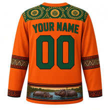 Load image into Gallery viewer, Zambia Original Hockey Jersey in Copperbelt Orange, back view with your name and number – chitenge-print yoke and Tonga basket zigzag sleeve bands