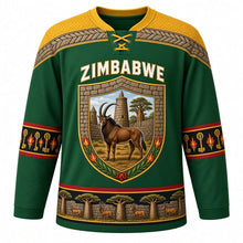 Load image into Gallery viewer, Zimbabwe Original Hockey Jersey in Msasa Green, front view – ornate stone-block shield crest with sable antelope, Great Zimbabwe walls and flame lilies, chevron masonry yoke, detailed artwork, custom name and number